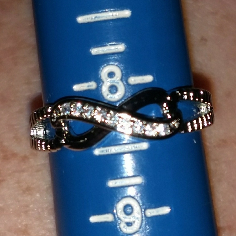 Genuine .925 sterling silver infinity design ring